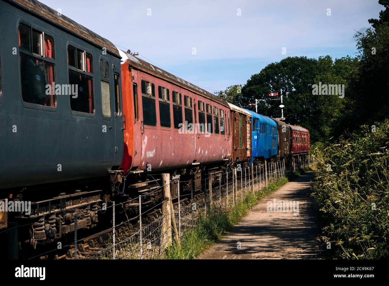 Old railway carriages at the Brampton Halt on the Brampton Valley Way, a disused railway line, now a public footpath and cycle path on the National Cy Stock Photo