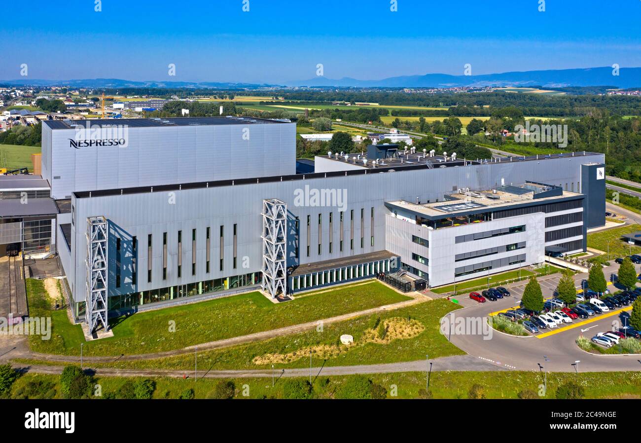 Factory for Nespresso coffee capsules of the Nestlé Nespresso SA, architect David Linford, Avenches, Vaud, Switzerland Stock Photo