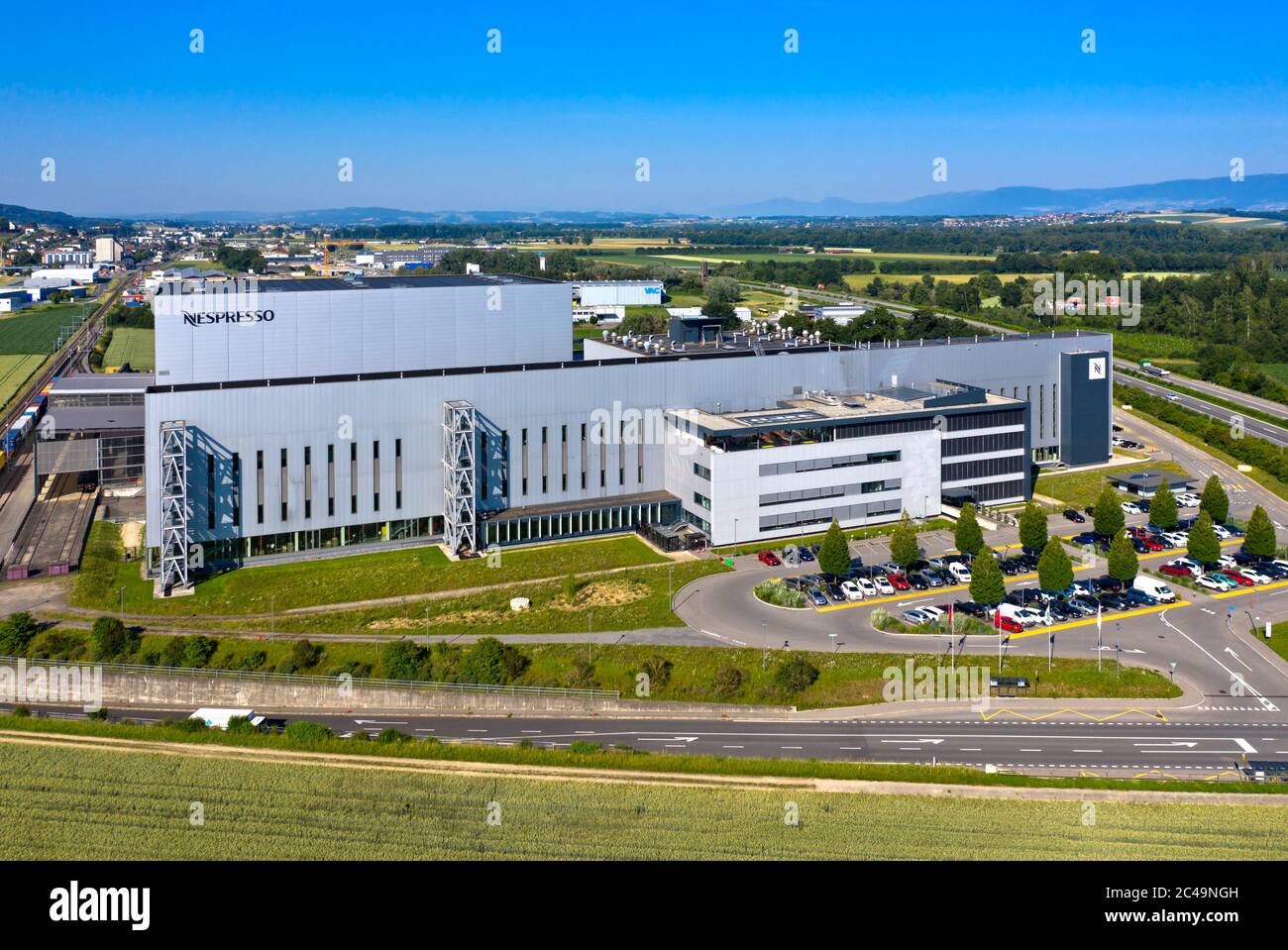 Factory for Nespresso coffee capsules of the Nestlé Nespresso SA, architect David Linford, Avenches, Vaud, Switzerland Stock Photo