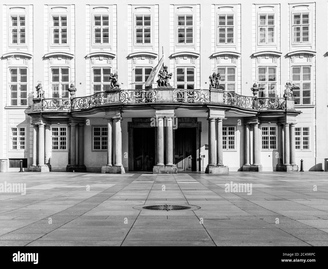 Prague Castle - entrance door with balcony to the Archives on Third Courtyard, Prague, Czech Republic. Black and white image. Stock Photo
