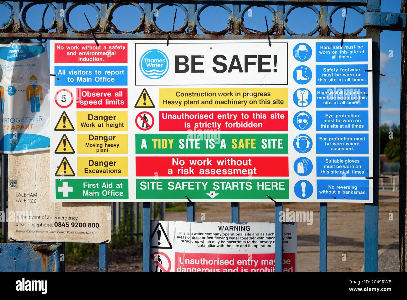 A large and confusing health and safety sign on an entrance to a Thames Water building site in Laleham Surrey England UK Stock Photo