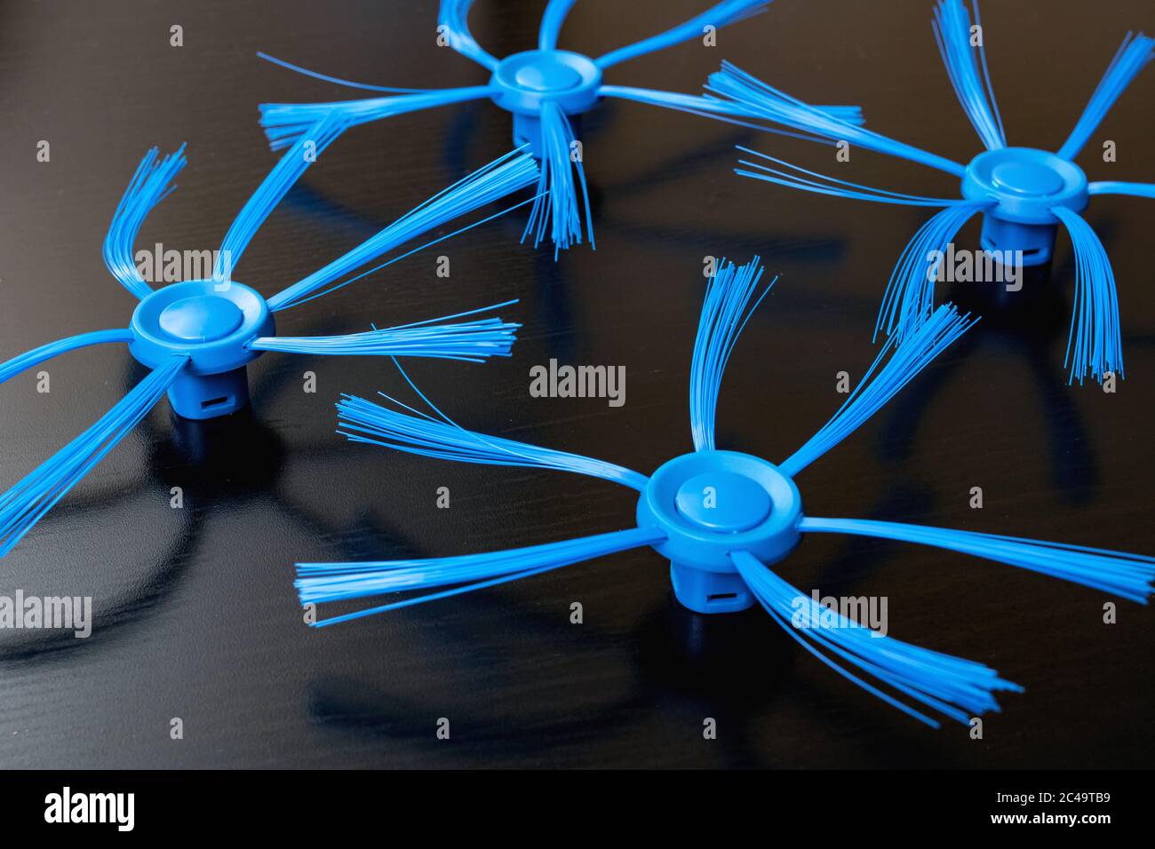 Blue brushes for the robot vacuum cleaner Stock Photo Alamy