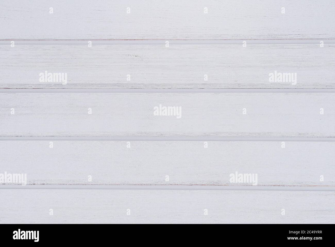 Vintage white wood plank background with copy space. Painted wall with horizontal wooden planks. Stock Photo