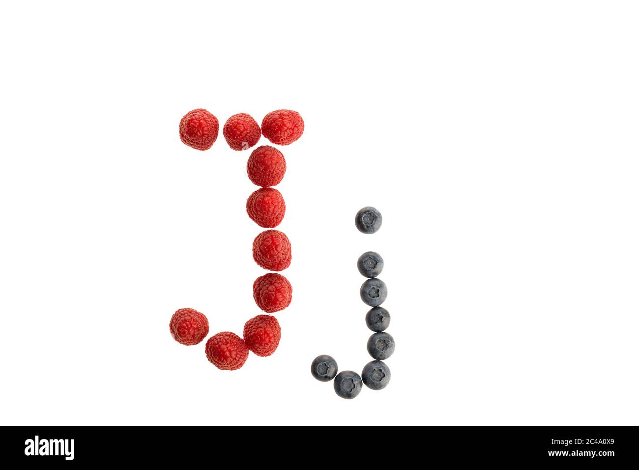 Alphabet from fresh fruit, raspberry and blackberry, isolated on a ...