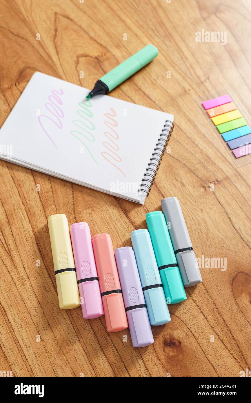 Drawing on a white sheet with a color highlighter. Top View Stock Photo -  Alamy