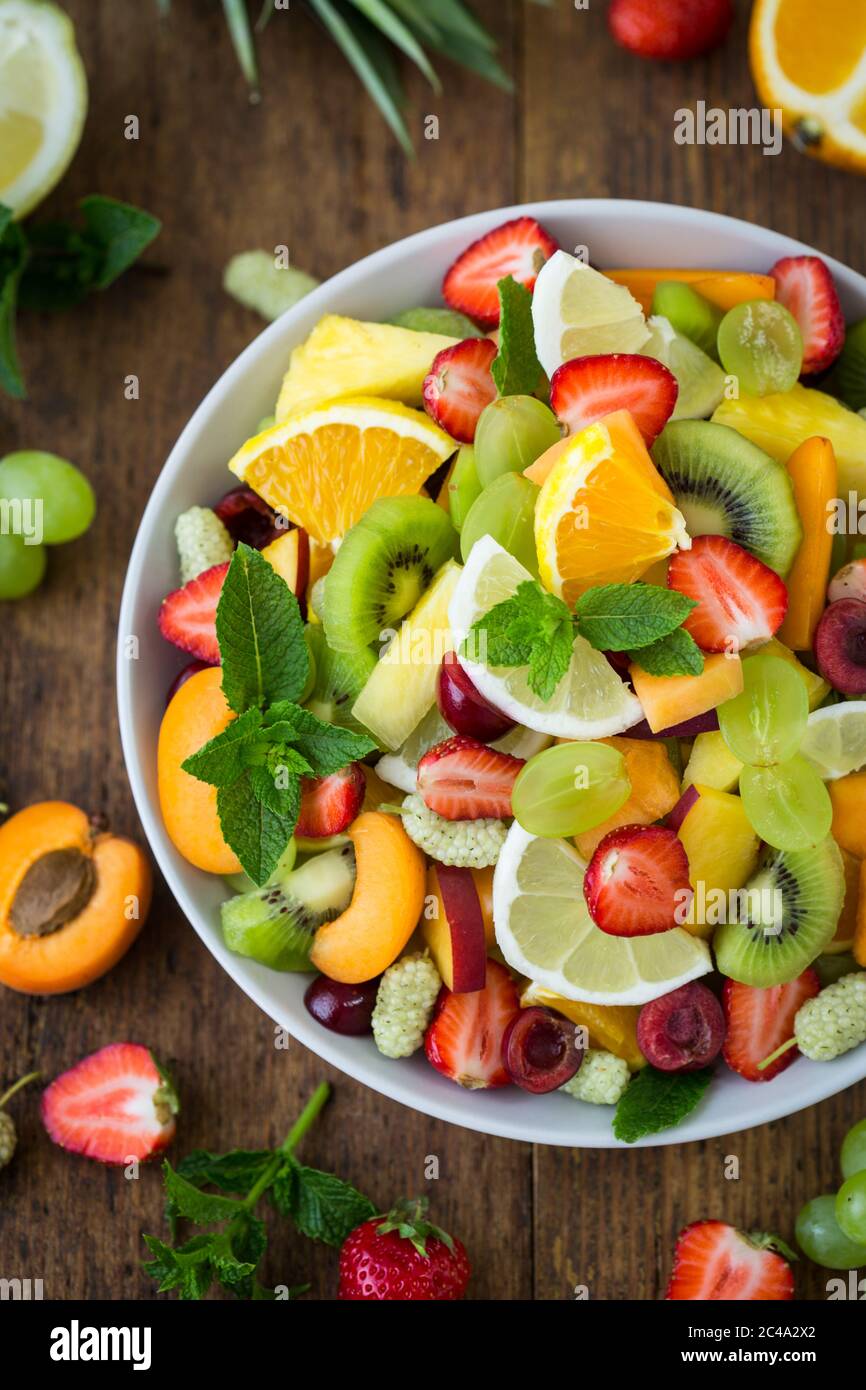 Fruit salad bowl pineapple berry hi-res stock photography and images ...