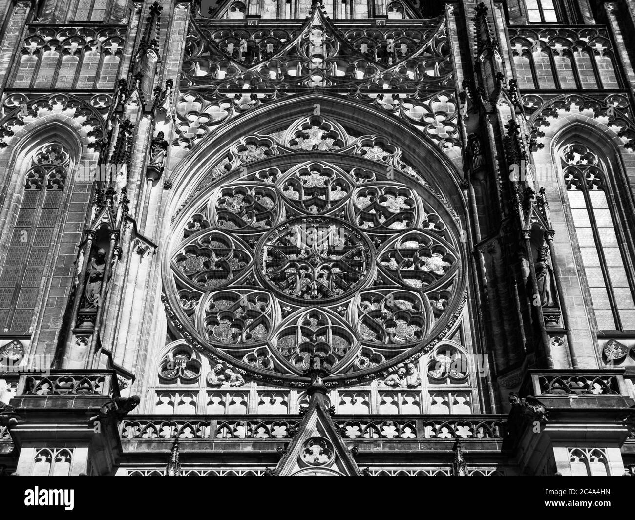 Detailed view on gothic rose window of St. Vitus Cathedral in Prague, Czech Republic. Black and white image. Stock Photo