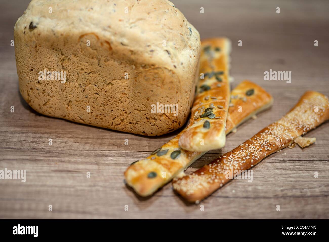 Molded home made bread and roll on table Stock Photo