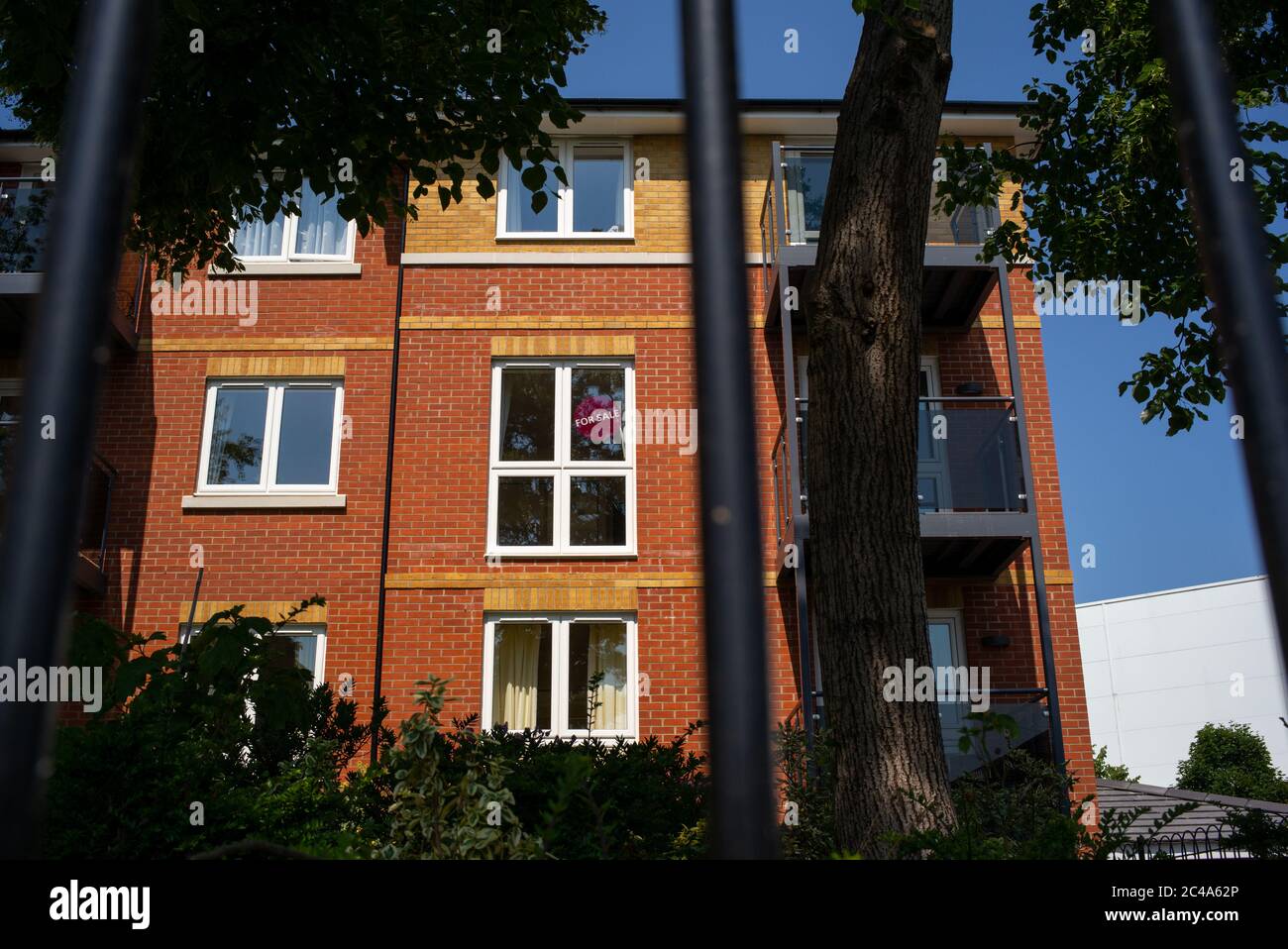 For sale sign in a newly built block of flats for the elderly from