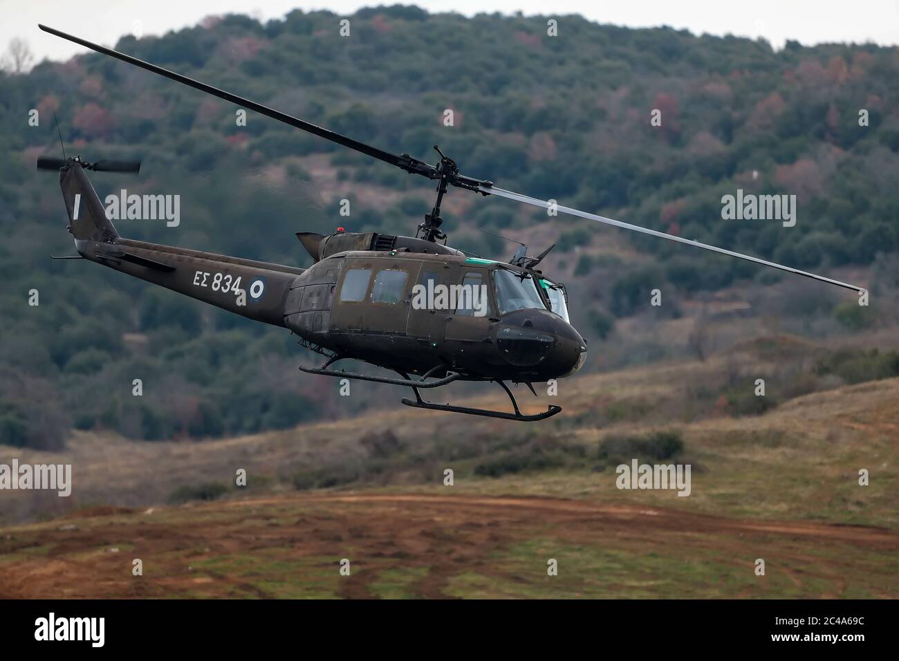 Askos, Greece - Feb 14, 2020: UH-1H Huey Helicopter takes part at a international military exercise with real fire (Golden Fleece -20) between Greek , Stock Photo