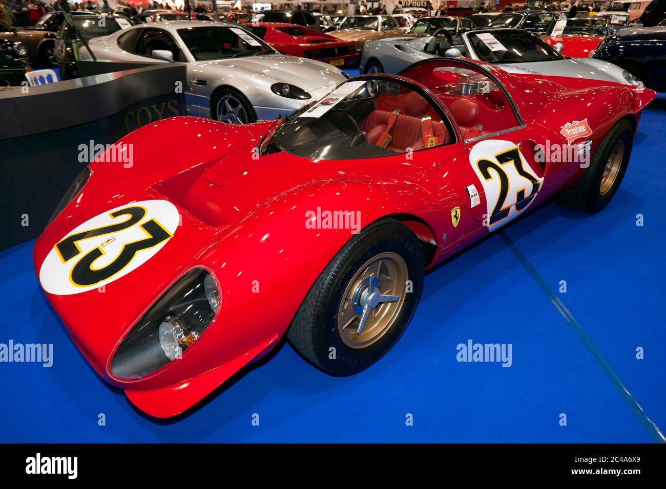 Three-quarters front view of a  Red, 1967 Specification 330 P4 Evocation, in the Coys Auction Area, of the 2019 London Classic Car Show Stock Photo