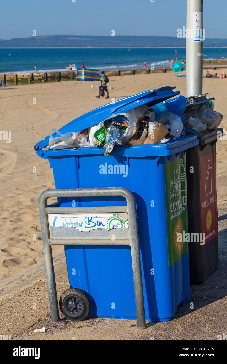 Rubbish left behind on the hottest day of the year during heatwave at Bournemouth beach, Dorset UK in June - litter garbage Stock Photo