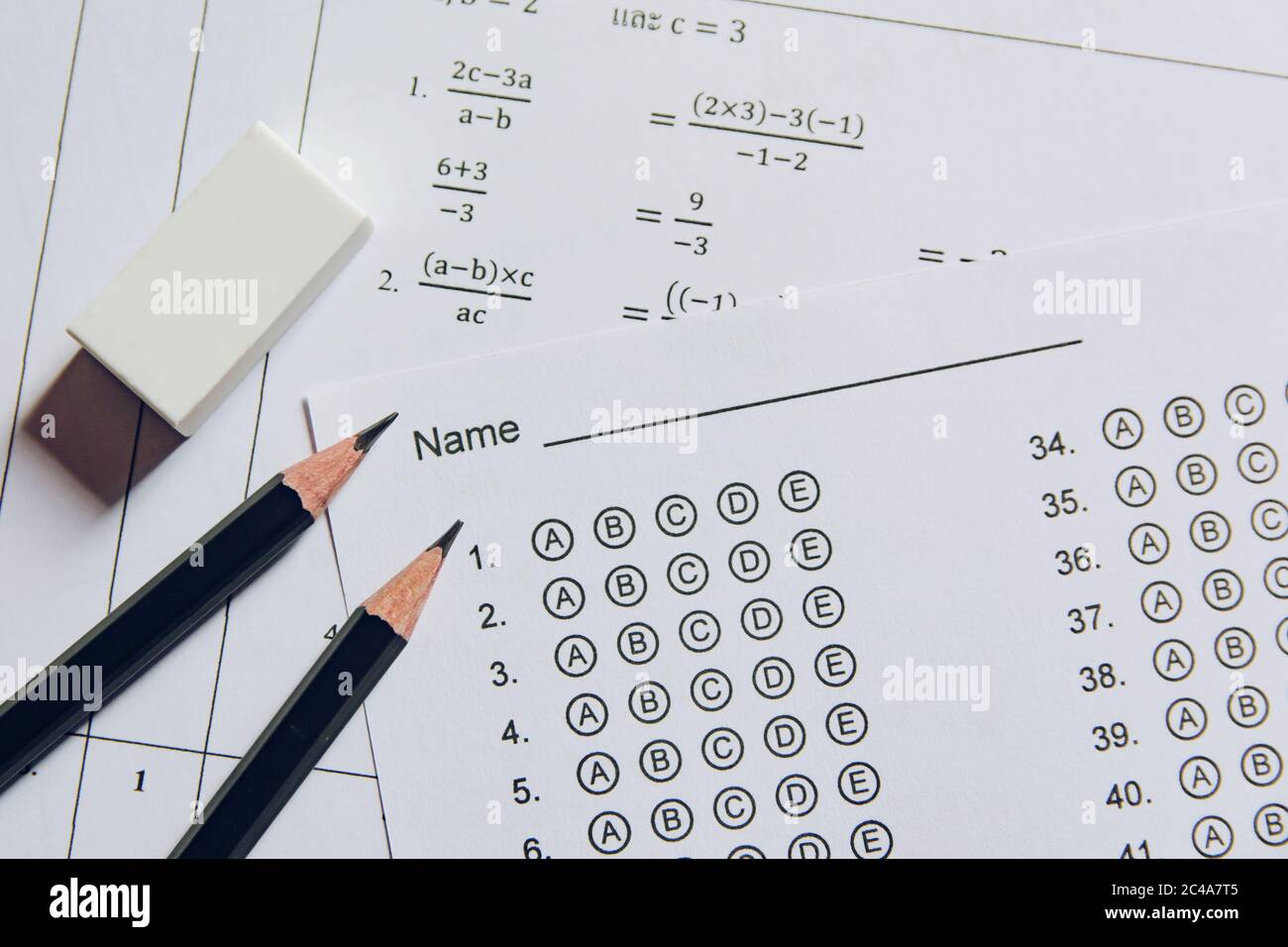 Pencil And Eraser On Answer Sheets Or Standardized Test Form With Answers Bubbled Multiple Choice Answer Sheet Stock Photo Alamy