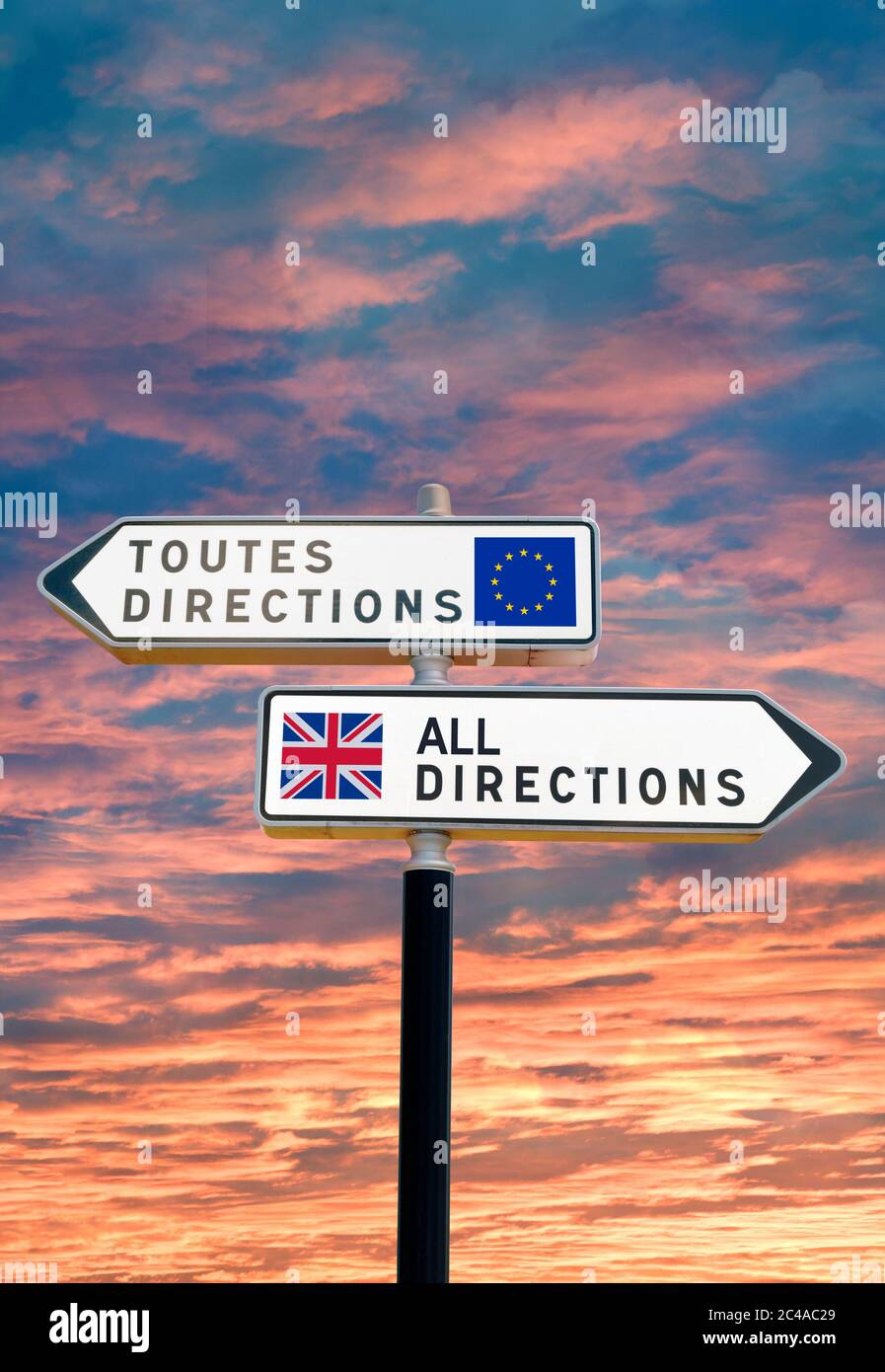 French style double signpost with opposing UK/EU pointers. Stock Photo