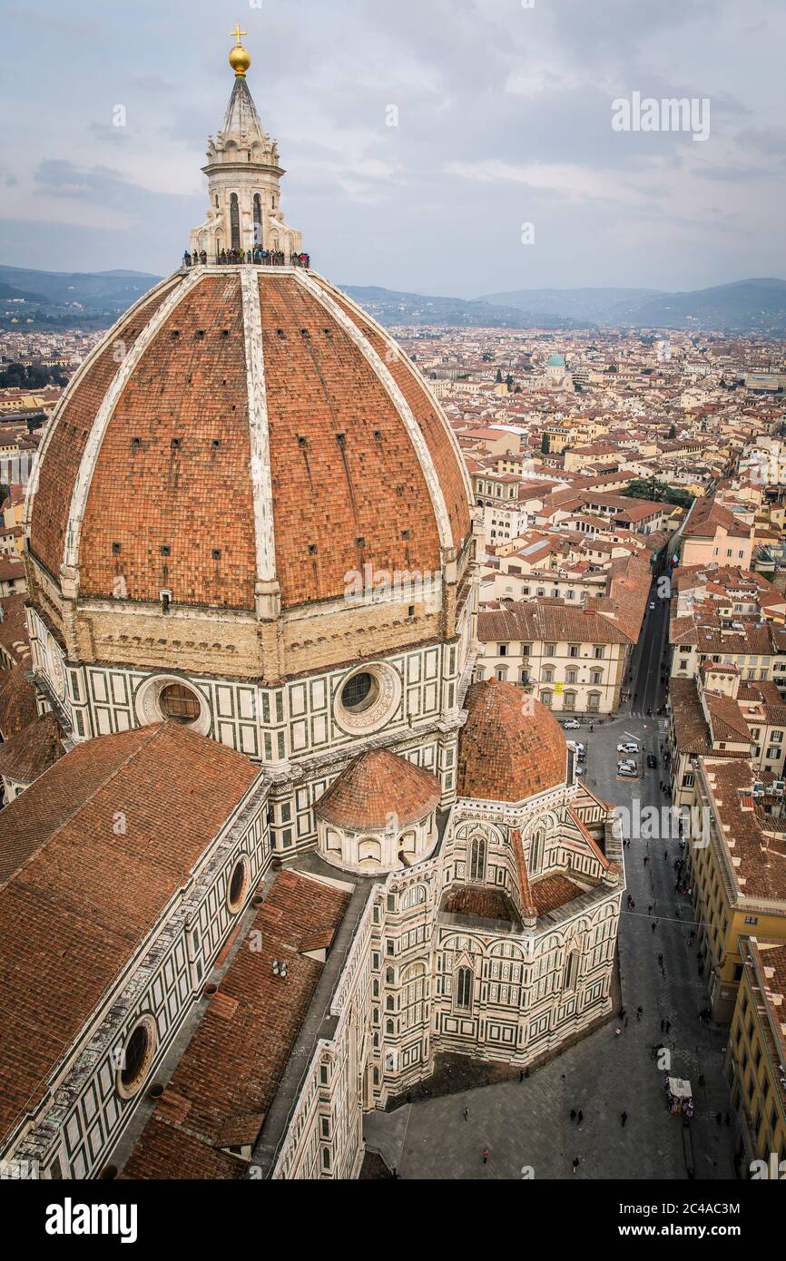 The dome of the Cattedrale di Santa Maria del Fiore (Florence Cathedral) in Piazza del Duomo (square) as seen from the Giotto's Campanile (bell tower) Stock Photo