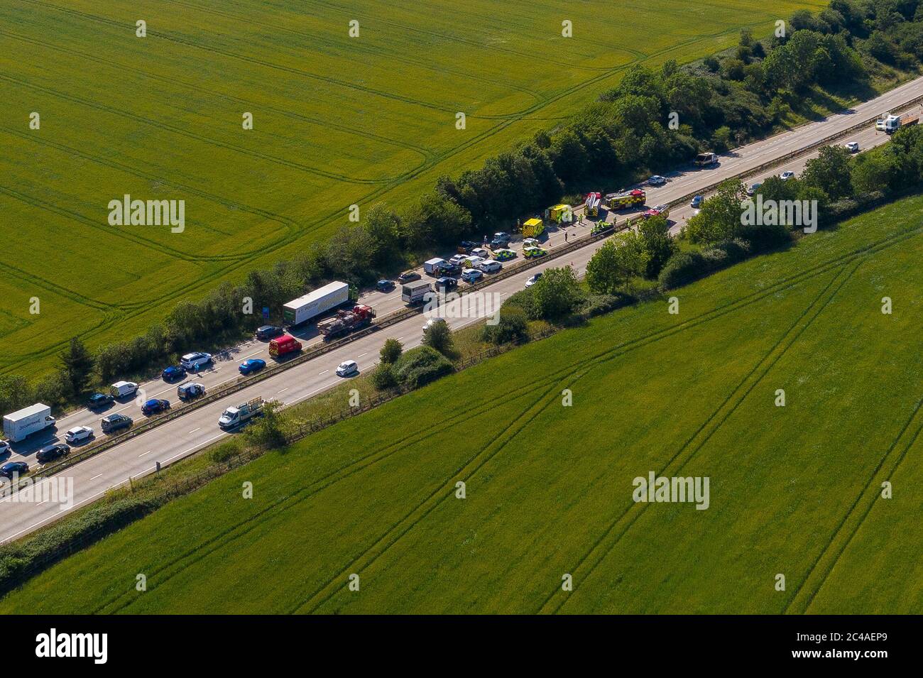 Essex, UK. Accident shuts A12 between junctions 16 and 16 causing huge tailbacks. A car appears to have struck the central reservation. Emergency services are on scene. Ricci Fothergill/Alamy Live News Stock Photo