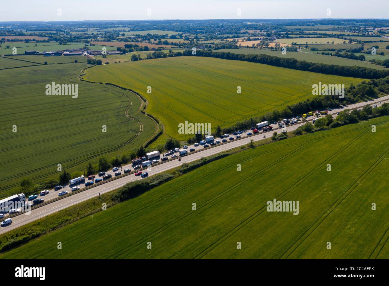 Essex, UK. Accident shuts A12 between junctions 16 and 16 causing huge tailbacks. A car appears to have struck the central reservation. Emergency services are on scene. Ricci Fothergill/Alamy Live News Stock Photo