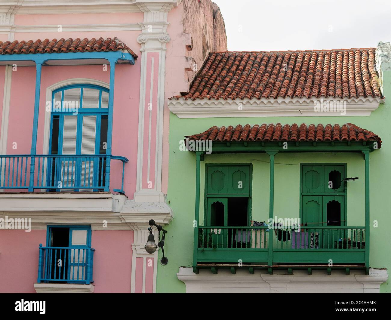 Old Havana colonial buildings development with blue and green balconies Stock Photo