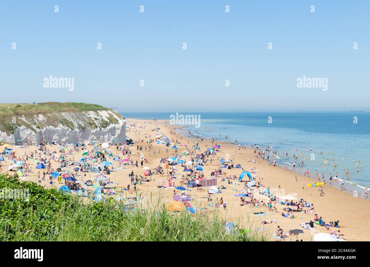 Broadstairs, Kent, England  - Despite lockdown restrictions due to the Coronavirus, crowds gather on the sandy beach on the hottest day of the year Stock Photo