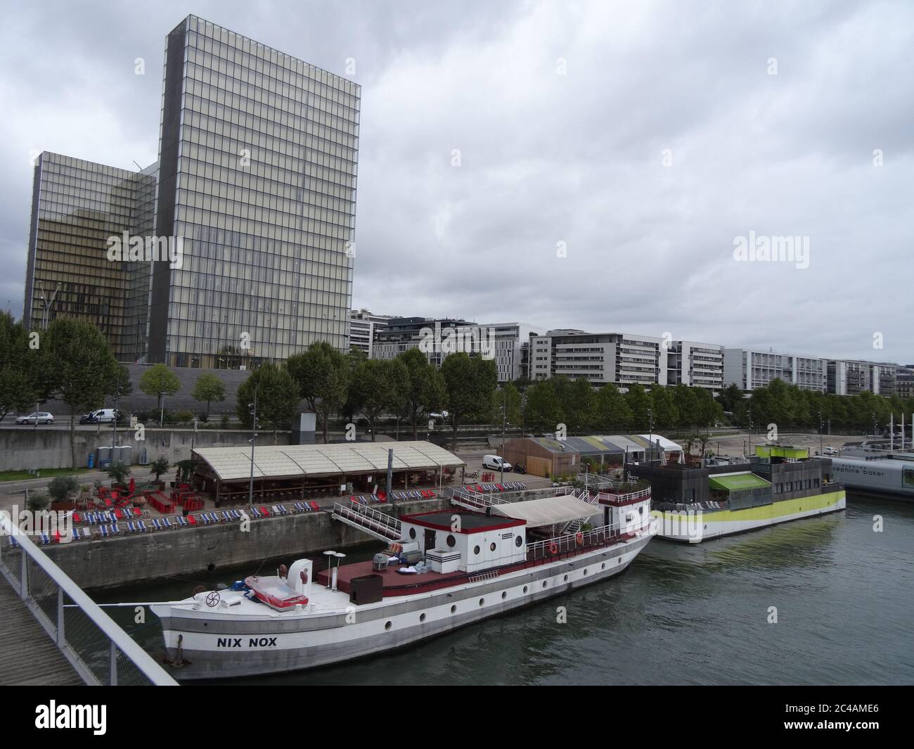 Bercy is a popular arena and park near it. Located in Paris, France. Walk through the park and the bridge Passerelle Simone-de-Beauvoir over the Seine Stock Photo