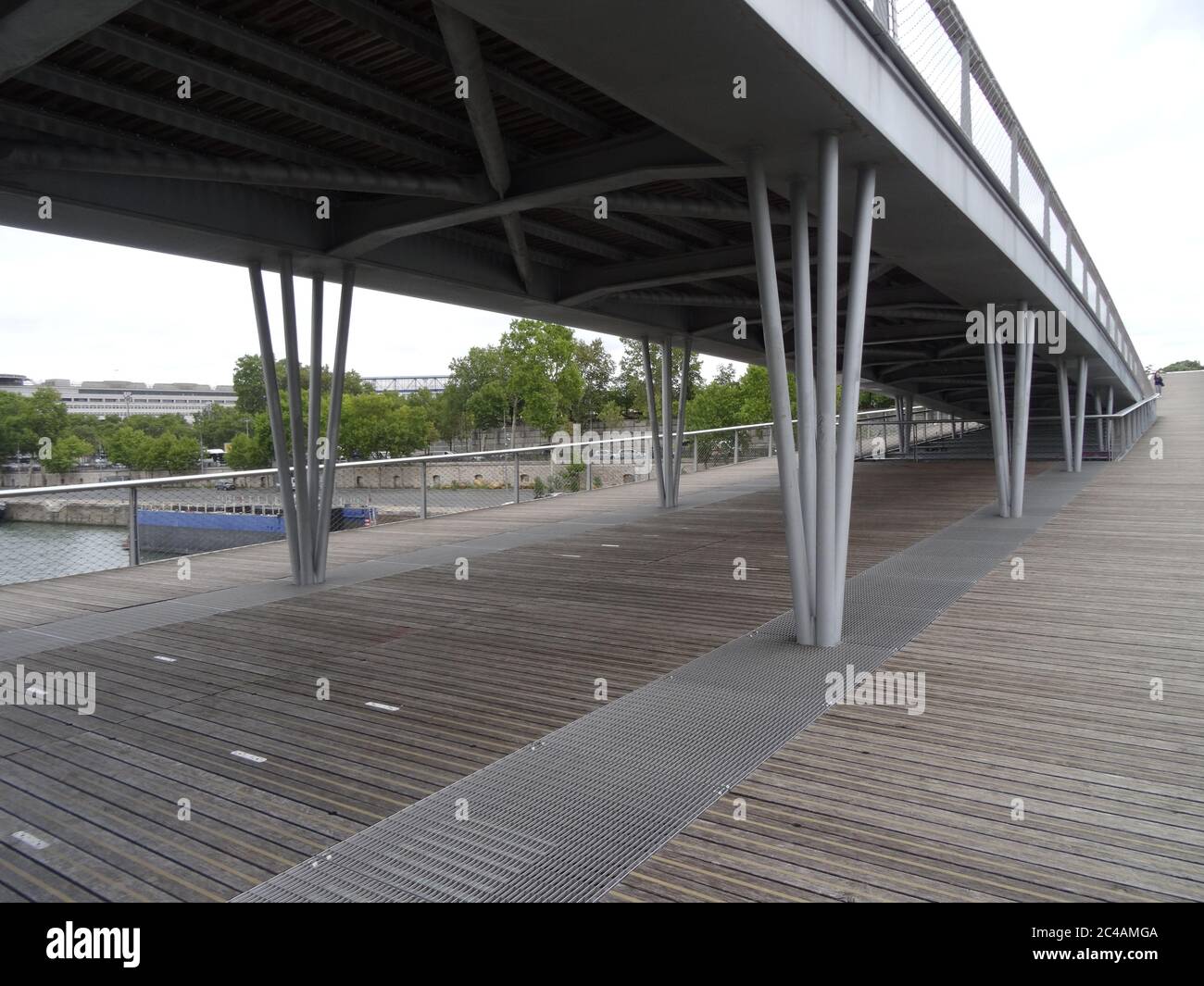 Bercy is a popular arena and park near it. Located in Paris, France. Walk through the park and the bridge Passerelle Simone-de-Beauvoir over the Seine Stock Photo