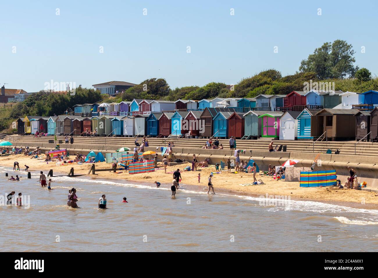 Essex, UK. 25th June 2020. UK Weather Brits enjoy a day at the beach