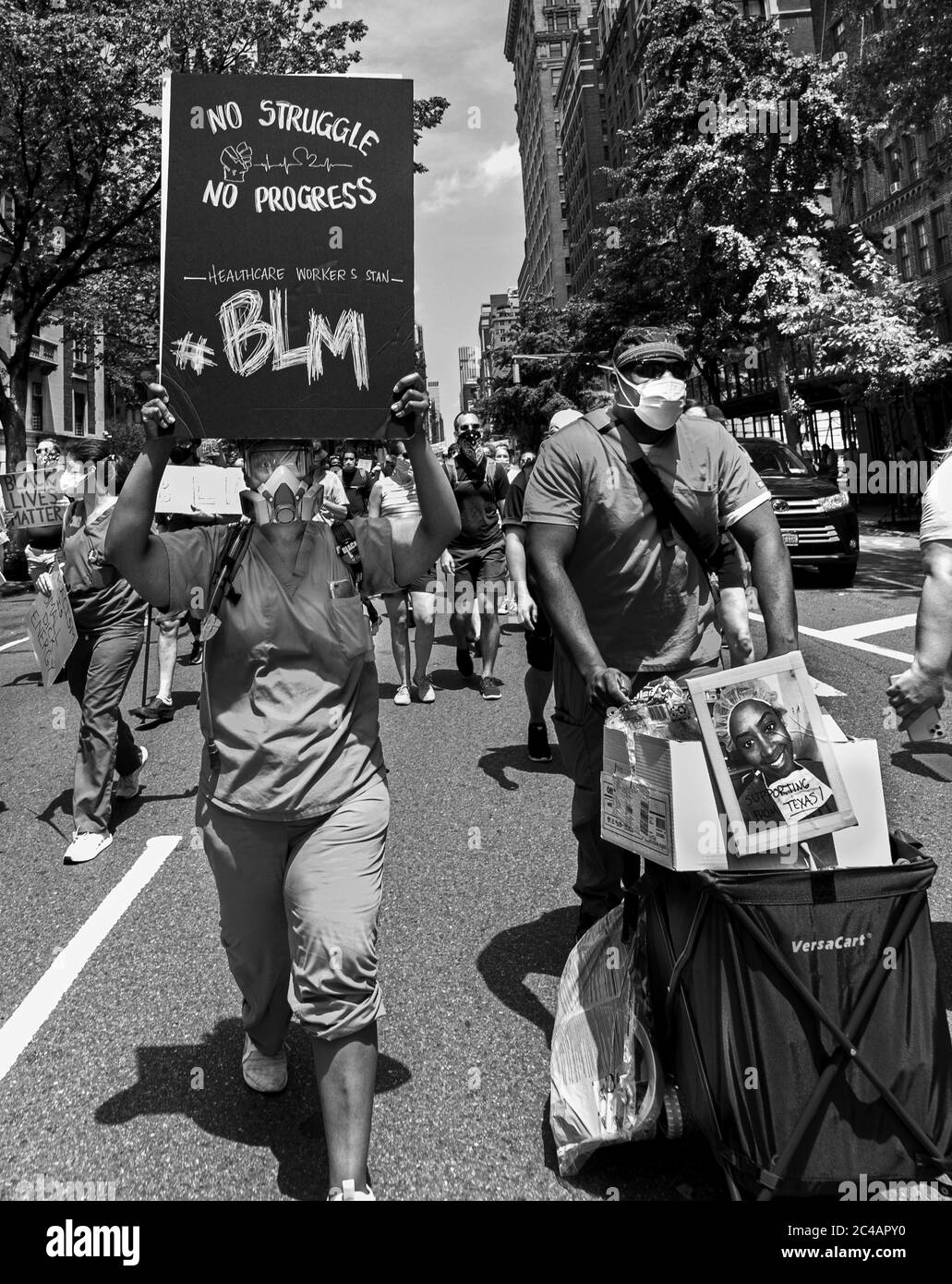 Manhattan, New York, USA - June 6, 2020: nurses marching in protest to the Killing of George Floyd by a policeman. Stock Photo