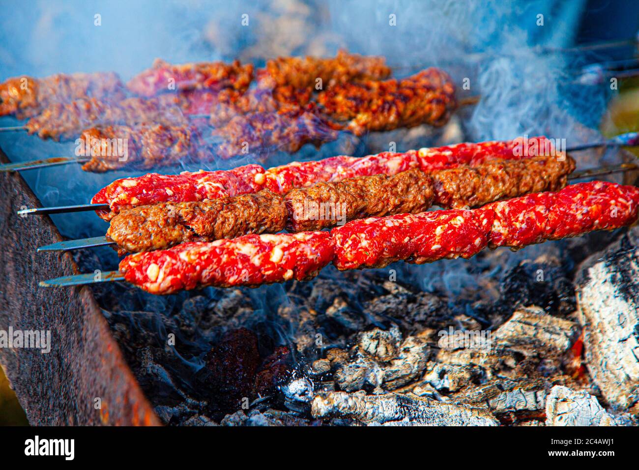 Traditional caucasian meat barbecue making Stock Photo - Alamy