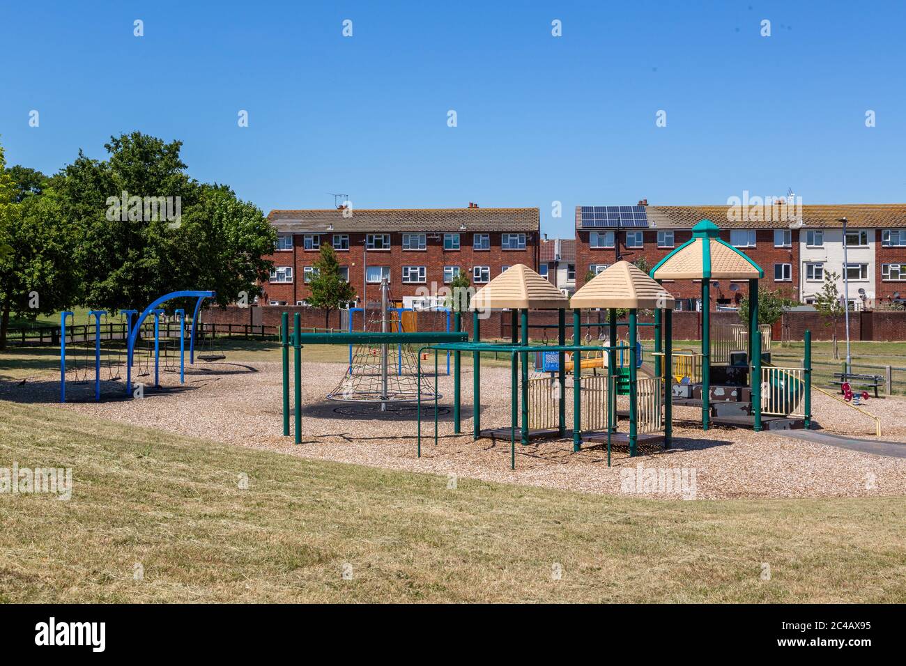 a child's playground or park empty on a summers day during Covid-19 lockdown Stock Photo