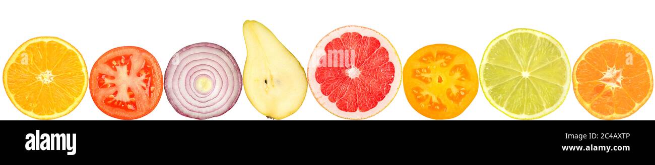 Isolated halves of orange, lemon, grapefruit, lime, pear, tomato, onion in row. Stock Photo