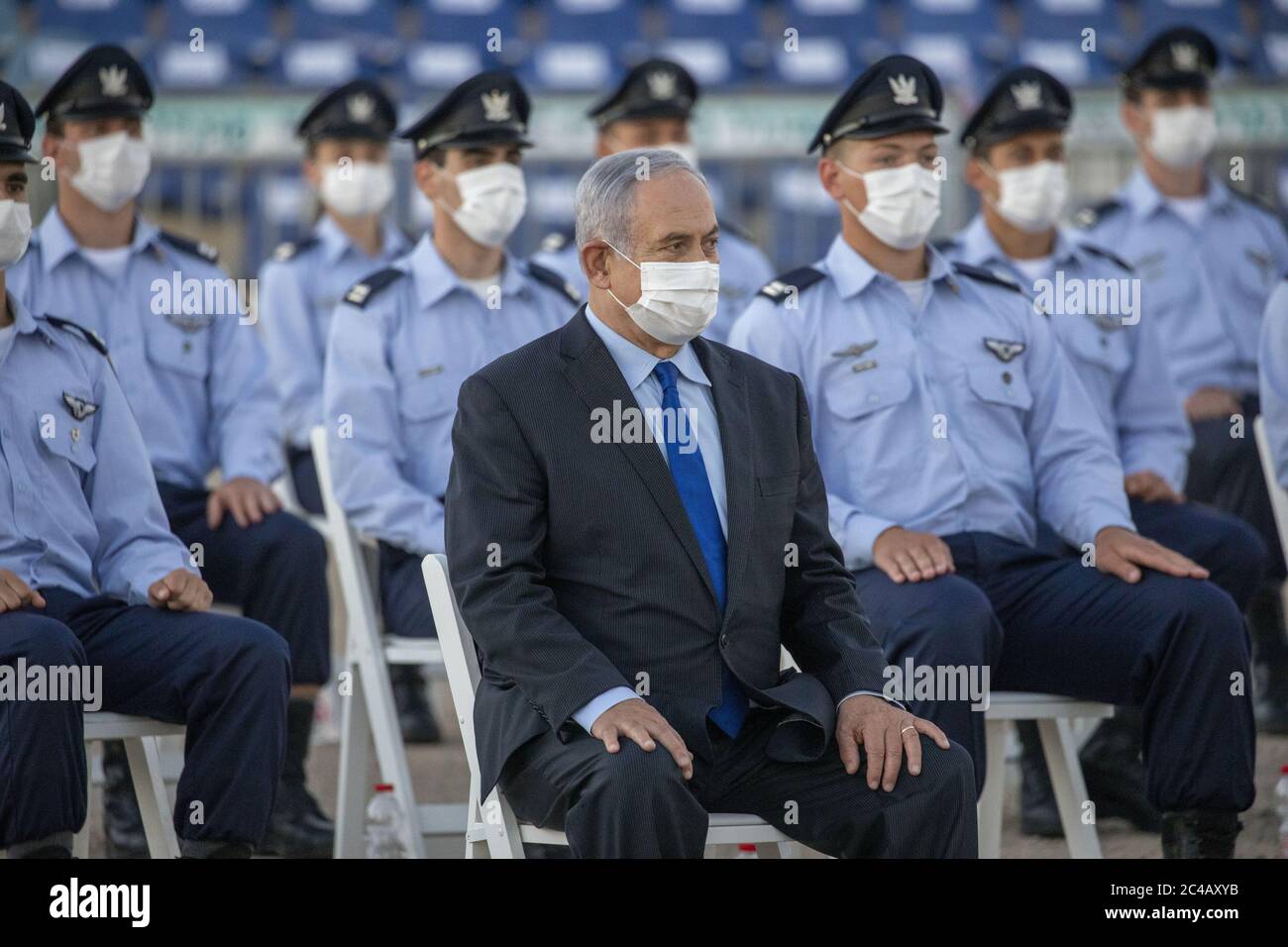 Hatzerim, Israel. 25th June, 2020. Israeli Prime Minister Benjamin Netanyahu, wearing a face mask to protect from COVID-19, attends a graduation ceremony for new pilots at Hatzerim air force base near the southern Israeli city of Beersheba, Israel, on Thursday, June 25, 2020. Photo by Ariel Schalit/UPI Credit: UPI/Alamy Live News Stock Photo