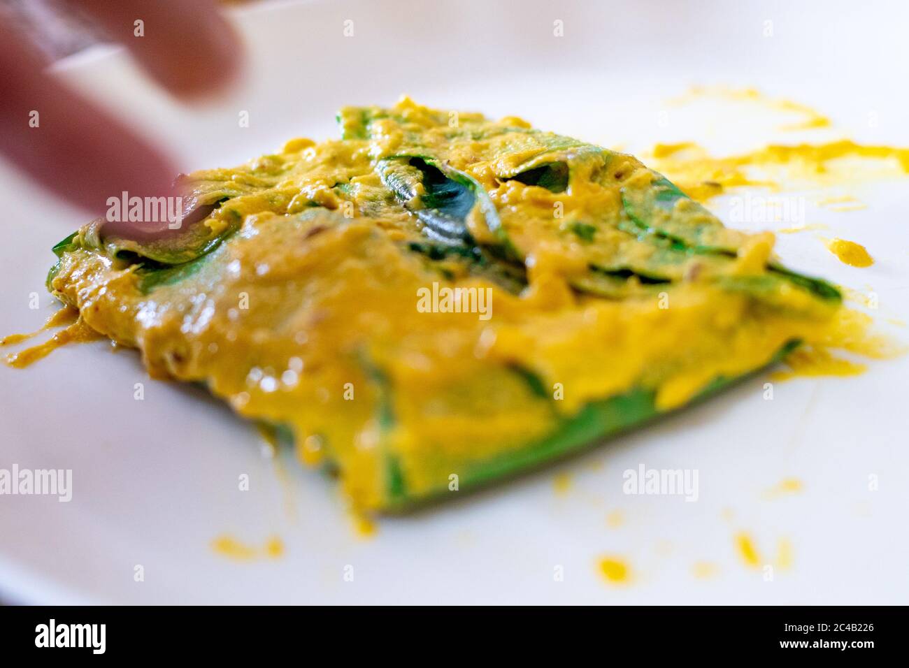 Beautiful Arvi colocasia root leaves coated with flour gram and ...