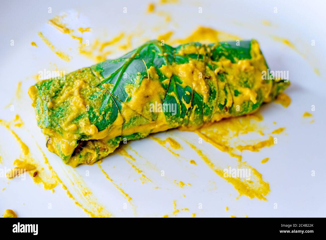 Beautiful Arvi colocasia root leaves coated with flour gram and ...