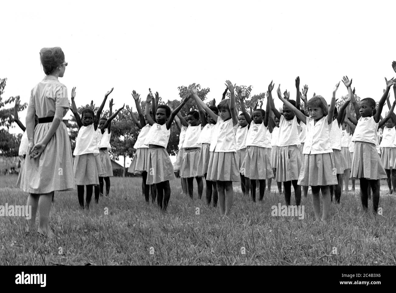 Children physical education class at school in Cote d'Ivoire or Ivory Coast 1963 Stock Photo