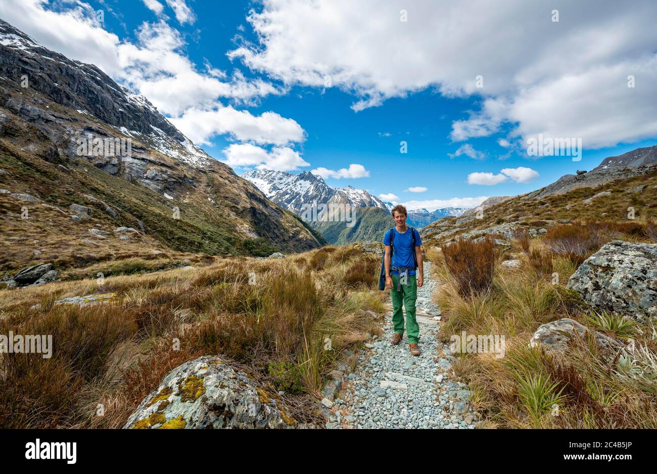 Hikers on the Routeburn Track, Mount Aspiring National Park, Westland District, West Coast, South Island Stock Photo