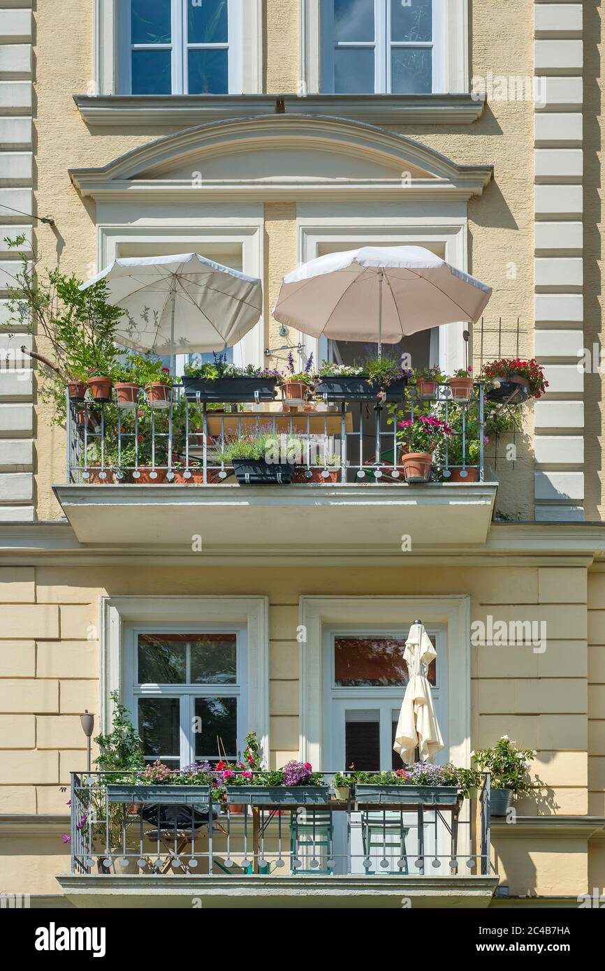 Green balconies with sunshades, Munich, Upper Bavaria, Bavaria, Germany Stock Photo