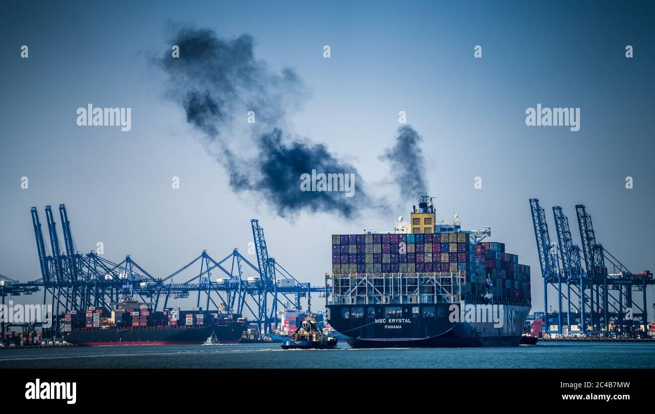 Ship Funnel Diesel Exhaust - Pollution from Ships - black diesel smoke from container ship entering Felixstowe Port UK Stock Photo