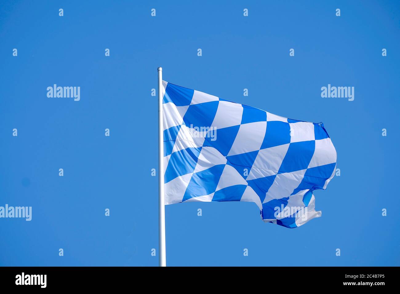 Bavarian flag waving in the wind, blue sky, Bavarian Parliament, Munich, Bavaria, Germany Stock Photo