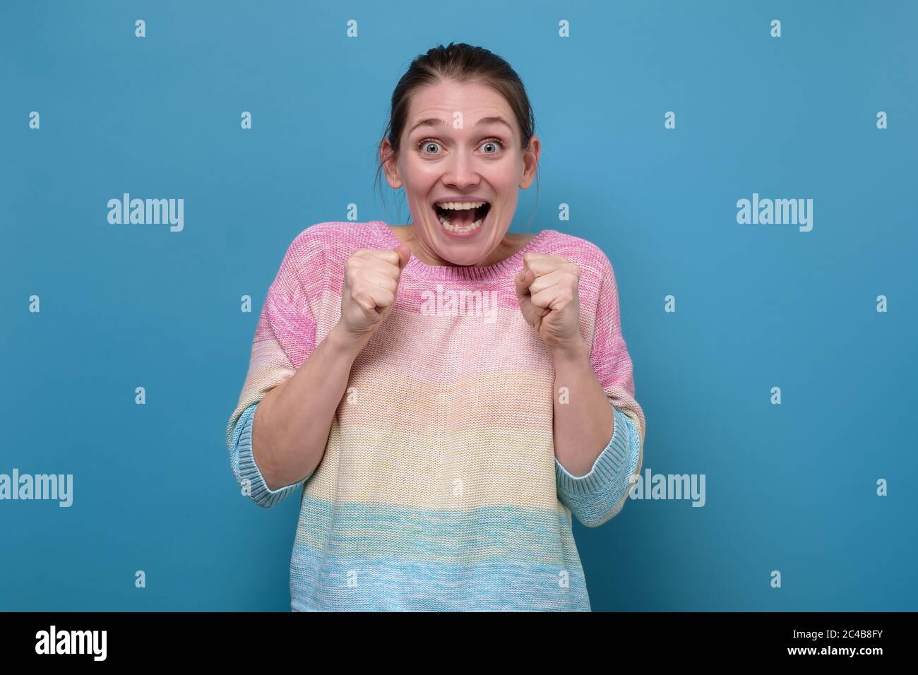 Attractive woman smiling being happy looking at camera Stock Photo - Alamy