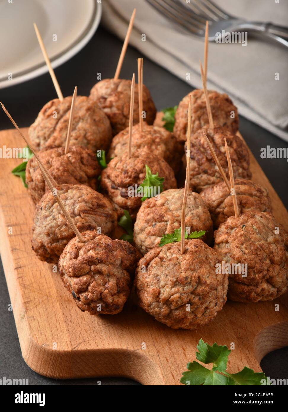 Italian meatballs with toothpicks in them as a party appetizer Stock Photo Alamy