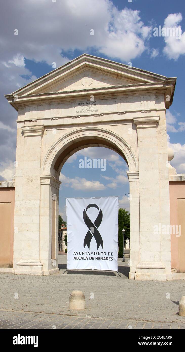 Puerta de Madrid (Madrid Arch) in Alcala de Henares with a banner  remembering the dead from Covid-19 black ribbon design Madrid Spain Stock  Photo - Alamy