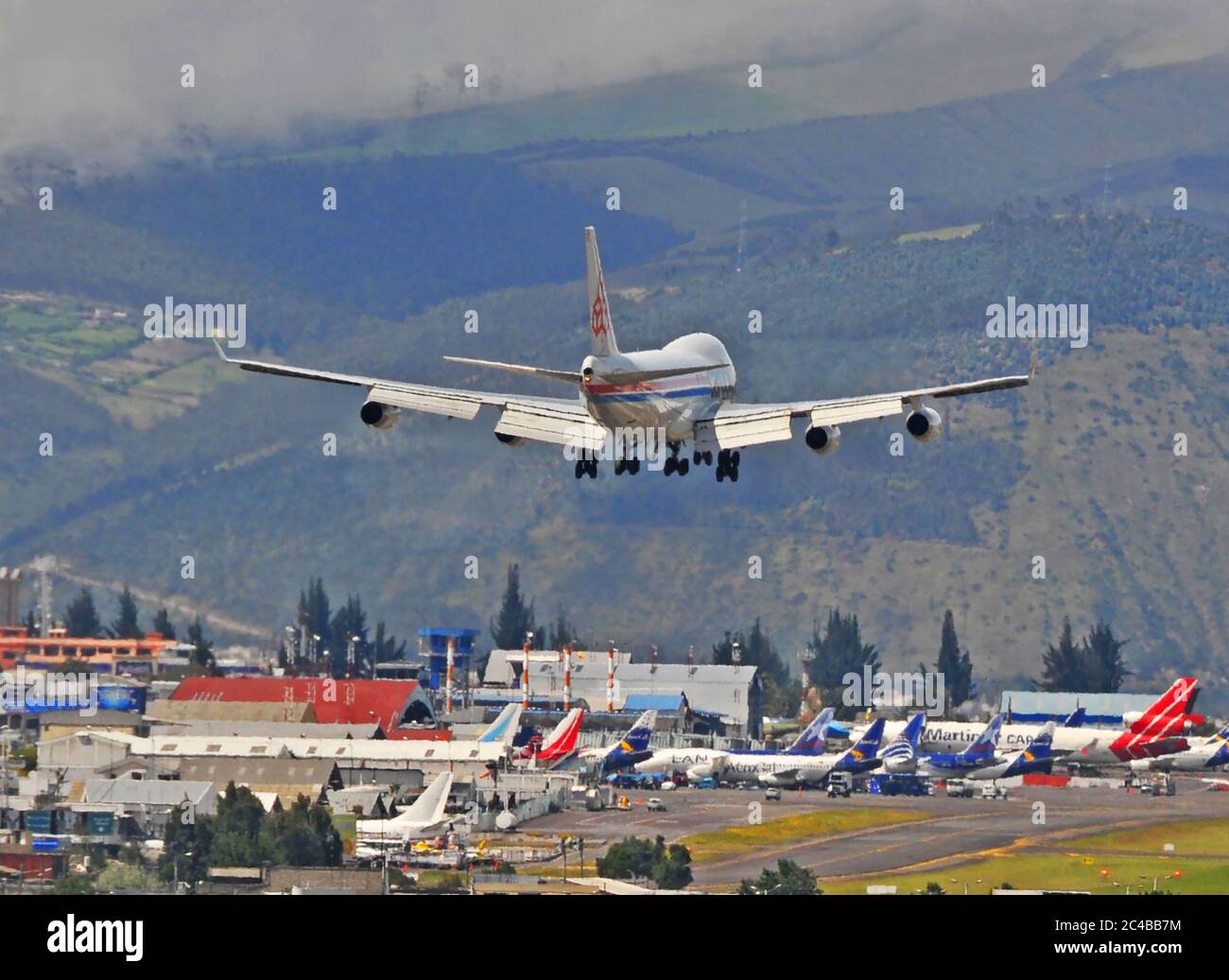 Boeing 747 landing on old Quito international airport, Ecuador Stock