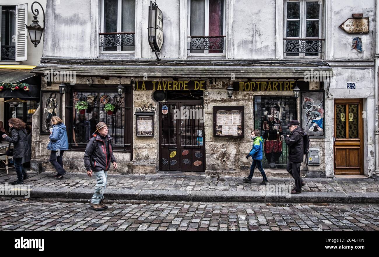Paris, France, Feb 2020, urban scene  by the bar-restaurant “La Taverne De Montmartre” in the heart of Montmartre district Stock Photo