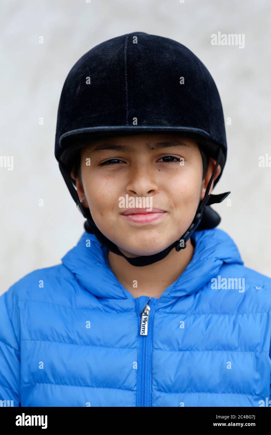 Young horse rider in beaumesnil, france Stock Photo