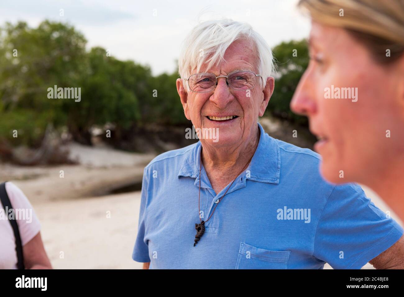 A senior man in a blue shirt and a mature woman on vacation in Botswana. Stock Photo