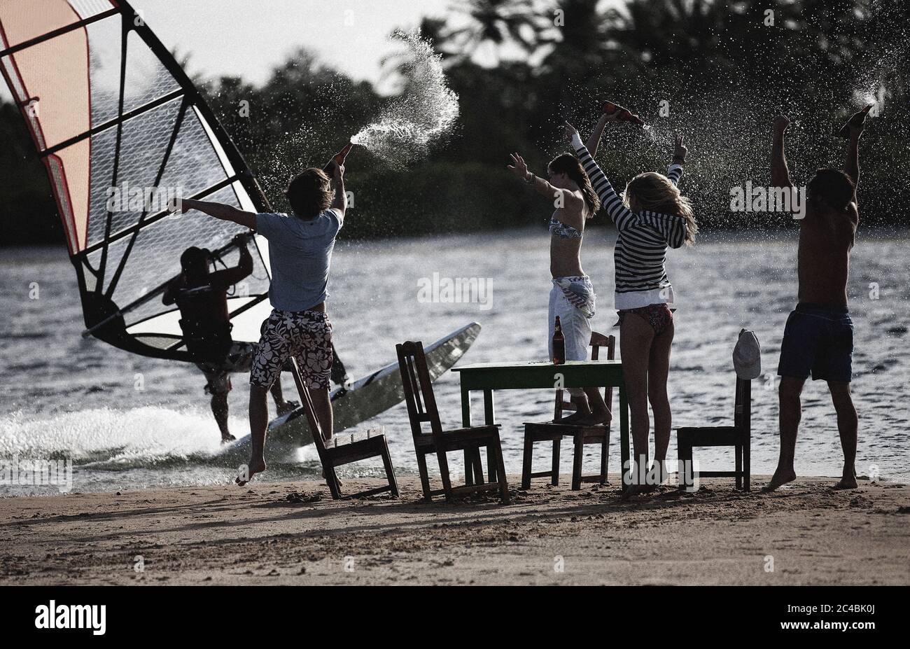 Man watching women on beach hi-res stock photography and images - Alamy