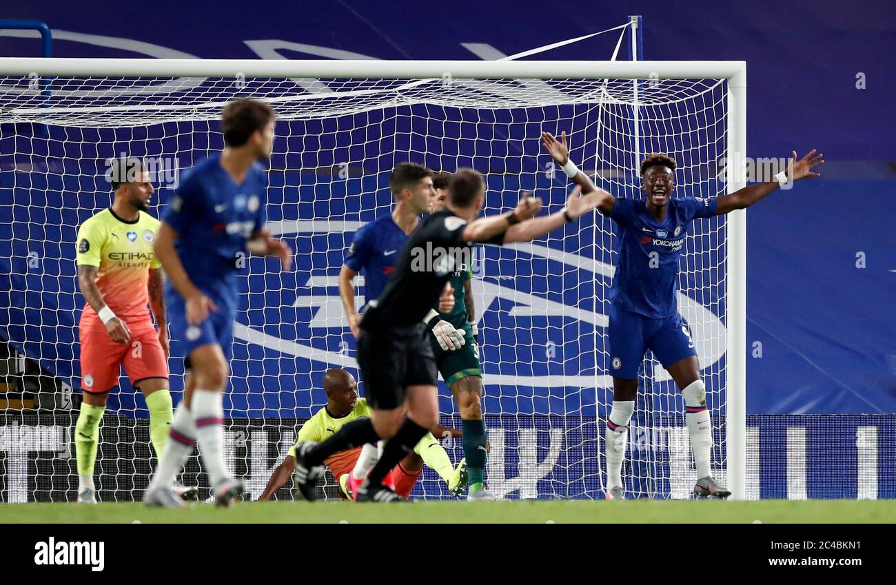 Chelsea's Tammy Abraham appeals for a penalty after Manchester City's Fernandinho hand balls the on the line during the Premier League match at Stamford Bridge, London. Stock Photo