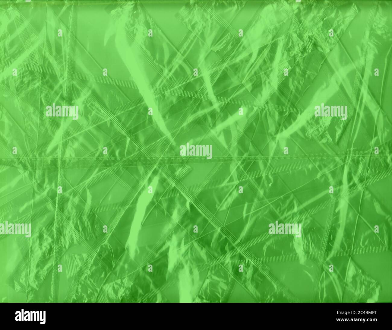 Fresh green abstract textured wallpaper graphic with space for your text, concept for spring season, springtime, new life, beginnings Stock Photo