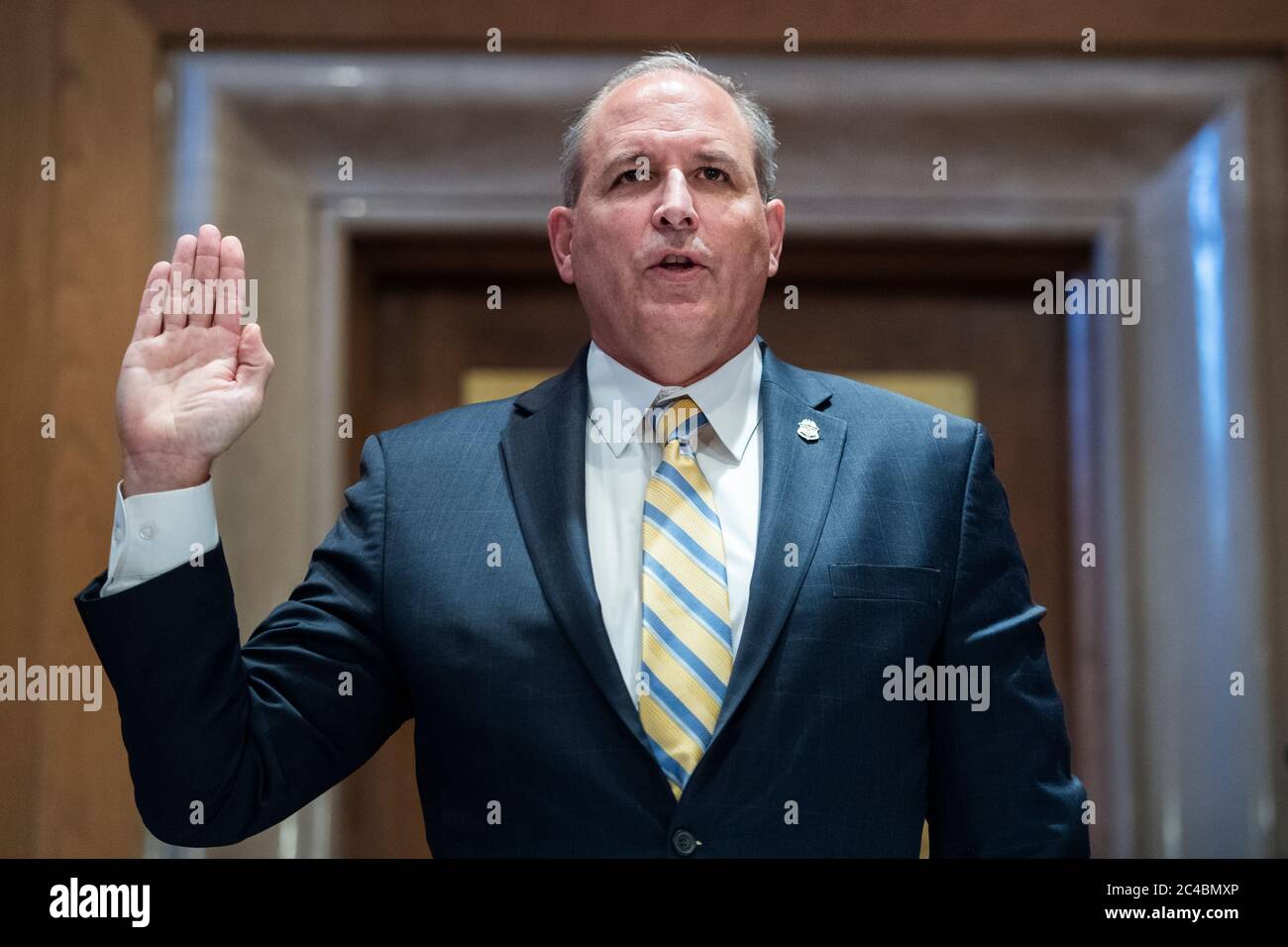 Mark A. Morgan, acting commissioner of the U.S. Customs and Border Protection, is sworn into the US Senate Homeland Security and Governmental Affairs hearing titled 'CBP Oversight: Examining the Evolving Challenges Facing the Agency,' in Dirksen Senate Office Building on Thursday, June 25, 2020. Credit: Tom Williams/Pool via CNP | usage worldwide Stock Photo