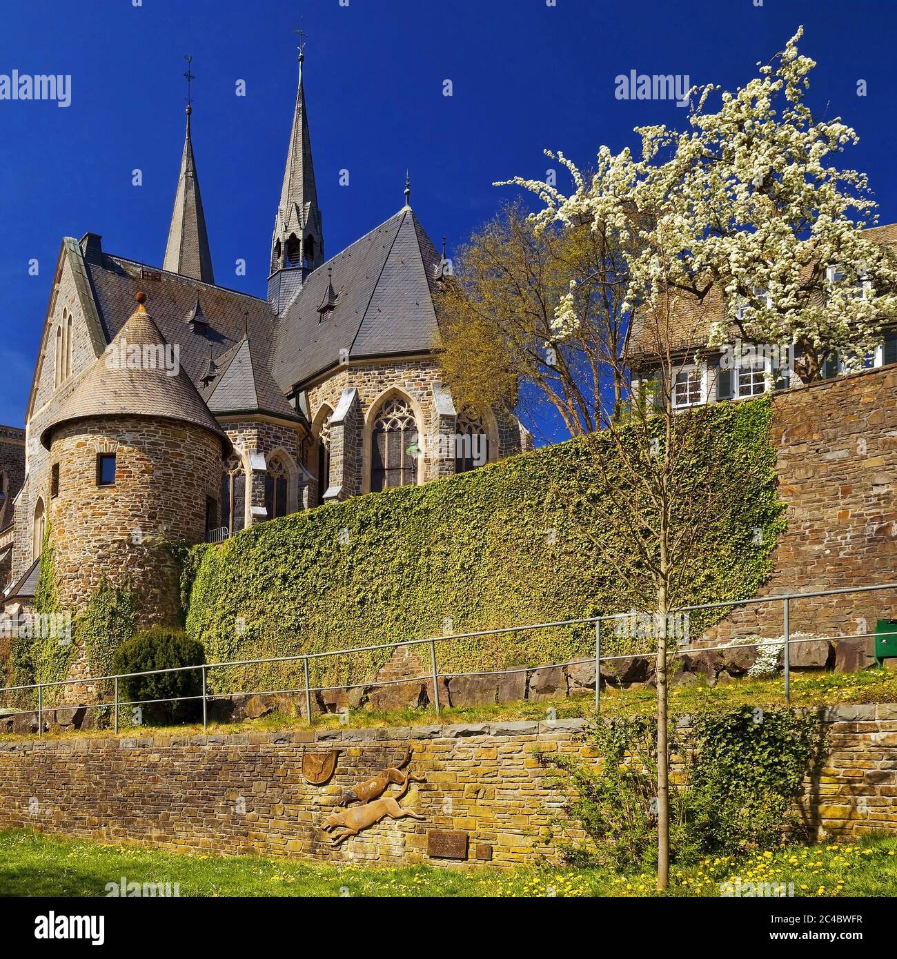 St Martinus church and town wall with tower Engelsturm in spring